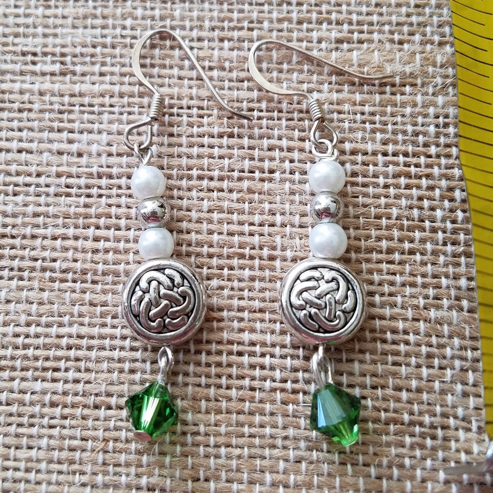 Sterling drop earrings w/Celtic Knot & grn crystal
